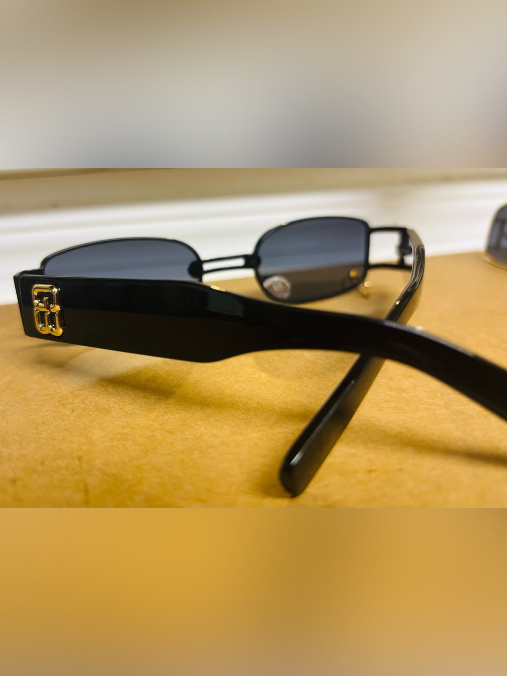 Balenciaga Eyewear Women's Black Rectangular Sunglasses with Gold Accent